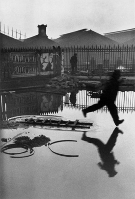 Henri Cartier-Bresson's Behind the Gare Saint-Lazare, Paris (Museum of Modern Art, 1932)