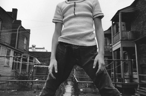 Mark Cohen's Defiant Girl up on Fence (Danziger Gallery, 1973)