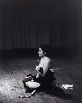 Yoko Ono's Cut Piece in Carnegie Hall (photo by Minoru Niizuma, Lenono Photo Archive/Museum of Modern Art, 1964)